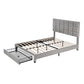 Platform bed with two nightstands and an upholstered headboard